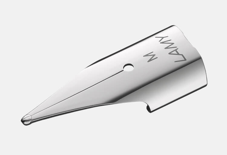 Close-up of a Lamy medium fountain pen nib in stainless steel showing the M size engraving on the body