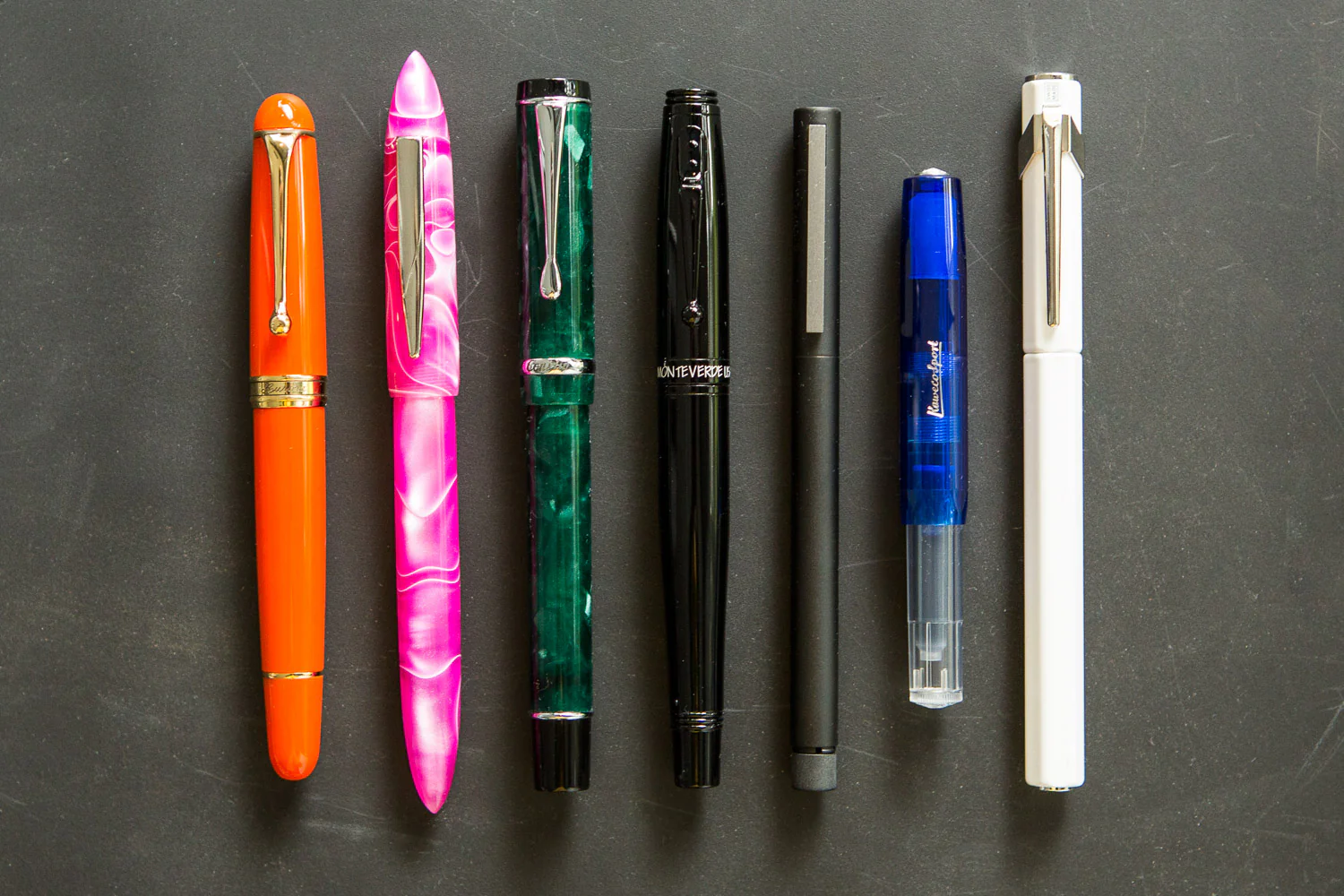 Types of fountain pen ink explained with different fountain pens showcasing writing styles and ink compatibility