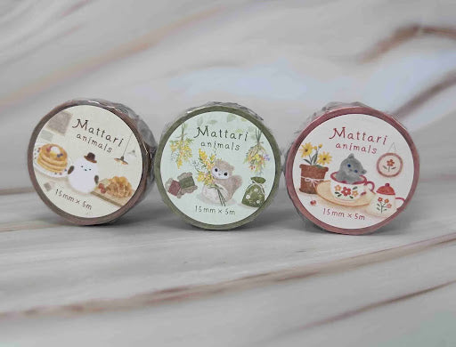 Colorful washi tape rolls in decorative patterns showing what is washi tape used for in crafts, planners and DIY projects